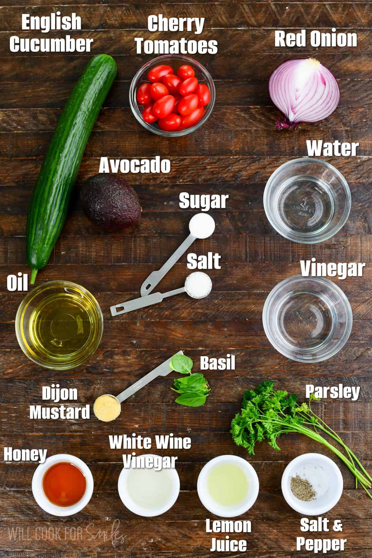 labeled ingredients to make a cucumber tomato and onion salad. 